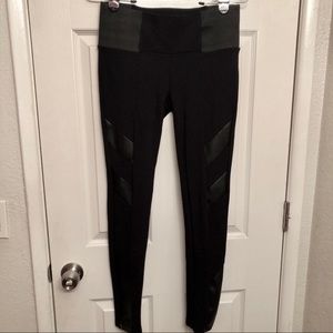 Black leggings with faux leather patches